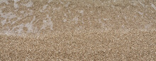 Fine Gravel Beach, Close-up Of Fine Pebble Beach, Washed Over By Clear Sea Water, On Croatian Adriatic Coast. Copy Space For Your Design. Web Banner.