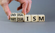 © Dzmitry - Universalism or particularism symbol. Concept words Universalism or Particularism on cubes. Businessman hand. Beautiful grey background. Business universalism or particularism concept. Copy space.