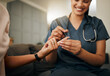 © Kay Abrahams/peopleimages.com - Zoom of doctor, diabetes or elderly woman hands with blood test, sugar or medical test with a glucometer. Healthcare, health nurse or diabetic lady consulting on glucose wellness in living room