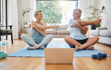 Canvas Print - Stretching, happy morning and senior couple training with online workout in the living room of their house. Elderly man and woman doing warm up before fitness exercise with internet yoga on tech