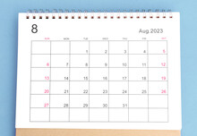 Close-up Of Calendar August Month Of 2023 On A Blue Background