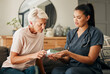 Home, healthcare and doctor help elderly patient in assisted living care facility, explain medicine on a sofa. Support, pills and senior care checkup with nurse discuss option and recovery treatment