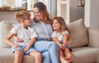 © Alexis S/peopleimages.com - Happy kids, mom and mothers day in living room sofa, love and relaxing together in Australia family home. Young children, smile parent and happiness, quality time and care on lounge couch for fun