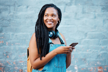 Wall Mural - Social media phone, music headphones and black woman thinking of motivation going to university in city. African college student with vision for future listening to podcast on mobile in Canada