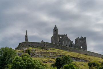 Wall Mural - view of the historic Rock of Cashel in County Tipperary of Ireland under an overcast and stormy sky