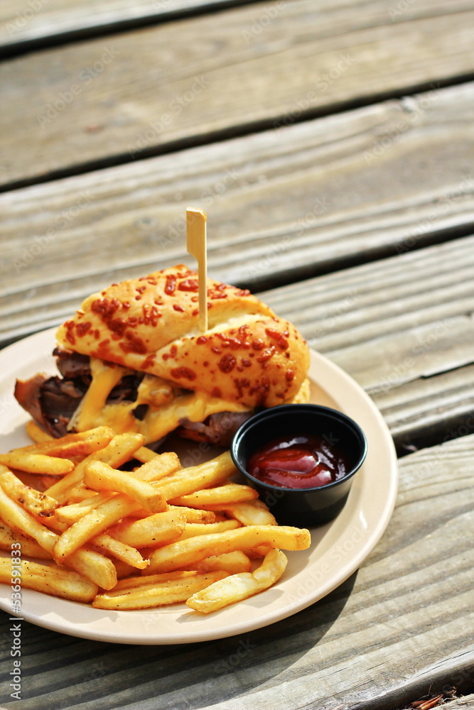 THE PRIME RIB DIPPER Food from applebee's restaurant served on a brown ...