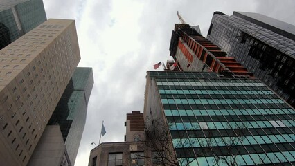 Wall Mural - Low angle of New York city buildings.