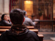 Cordoba, Spain - January 16 2022: a man attending church in spain