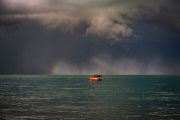 Wall Mural - Rainbow over the boat