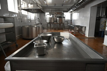 Modern shiny kitchen with stainless still kitchenware and equipment for restaurant-scale cooking