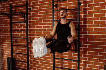 Wall Mural - Handsome muscular man doing sport exercises