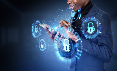 Wall Mural - African businessman finger touch tablet, cybersecurity and digital connection