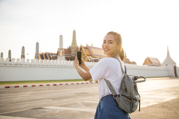 Wall Mural - Young Asian Lady Backpacker