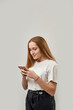 © Svitlana - Female teenage typing or messaging on smartphone
