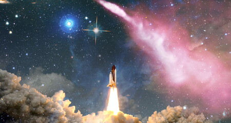 Wall Mural - shuttle launch in the clouds to outer space. dark space with stars on background.spaceship flight. e