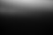 © ISENGARD - Dark black and gray blurred  gradient background has a little abstract light.