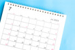 calendar July 2023 top view on a blue background