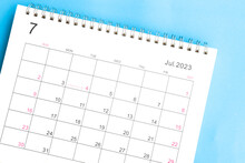 Calendar July 2023 Top View On A Blue Background