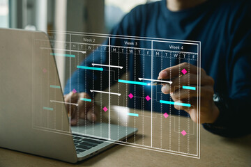 Project management concept , analyst working with computer in management system to make report with KPI and metrics connected to database.