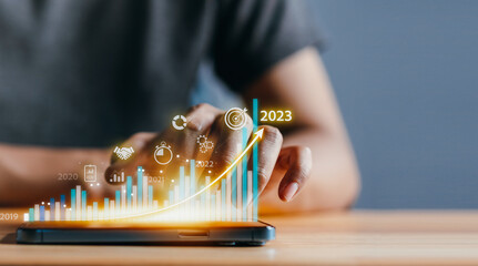 Aufkleber - 2023 Planning invest indicators long-term. Businessman analyzes profitability of working company with digital virtual screen graphics, positive, businessman calculates financial data investments.