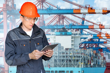Poster - Port manager with a digital tablet against the background of a ship loaded with containers in the seaport