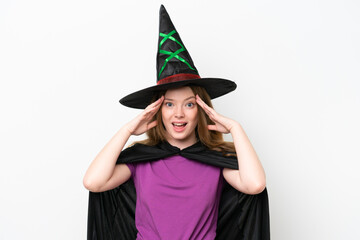 Young pretty woman costume as witch isolated on white background with surprise expression