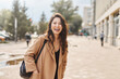 © olga pink - Lifestyle portrait of beautiful pretty asian kazakh woman laughing with a big, beautiful smile