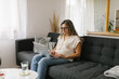 © STUDIO TAURUS - Adult woman using laptop at home