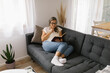 © STUDIO TAURUS - Woman reading a book at home