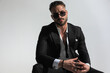 © Viorel Sima - sexy stylish guy with open collar shirt holding hands and posing