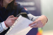 © as-artmedia - Conference Staff Member scan a QR code from attendee upon arrival to check-in site