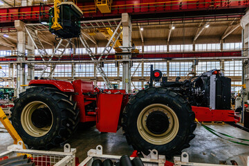 Wall Mural - Assembly process of agricultural tractors in industrial workshop