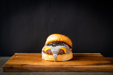 Sticker - truffle burger - beef with cheese and truffle mushroom sauce burger