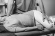 © Microgen - Physiotherapist Working with Senior Patient in Clinic