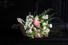 Bouquet Of Various Freshly Cut Flowers Lying On Top Of Piano