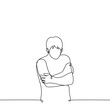 man is cold and shivering - one line drawing vector. concept lonely, freezing person