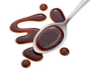 Wall Mural - Balsamic sauce in spoon isolated on white background, top view
