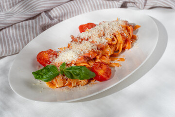 Wall Mural - Homemade Bucatini, Amatriciana Pasta with bacon, cherry tomatoes and parmesan