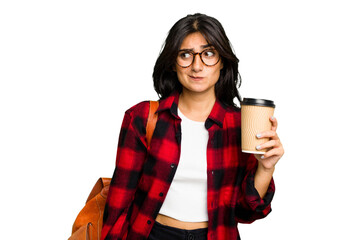 Wall Mural - Young student Indian woman holding a take away coffee isolated confused, feels doubtful and unsure.