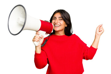 Young Indian woman holding a megaphone isolated