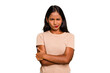 © Asier - Young Indian woman isolated frowning face in displeasure, keeps arms folded.