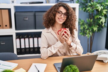 Sticker - Young hispanic woman business worker using laptop drinking coffee at office