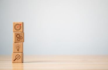 Wood cube block stacking with icon, Concept of  Action plan, Goal and target, success and business target.