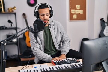 Sticker - African american man artist singing song at music studio