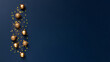 © MariiaDemchenko - Christmas composition with golden balls and confetti on blue background banner with copy space