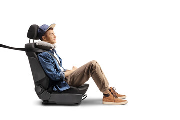 Poster - Guy sitting in a carseat with a seatbelt and pillow for his neck