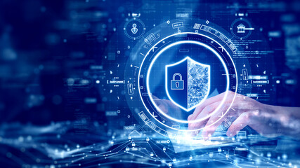 Leinwandbilder - digital technology concept cyber security data protection internet network connection. Man accessing a computer device with a protective shield against cyber threats. polygon on dark blue background.