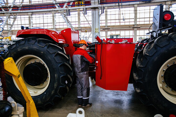 Wall Mural - The process of assembling agricultural tractors and harvesters