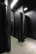Black fitting room in the clothes shop