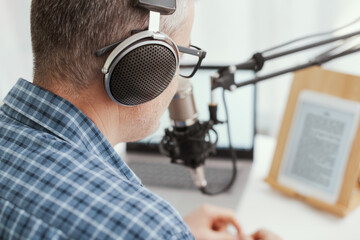 Wall Mural - Professional speaker checking the podcast schedule